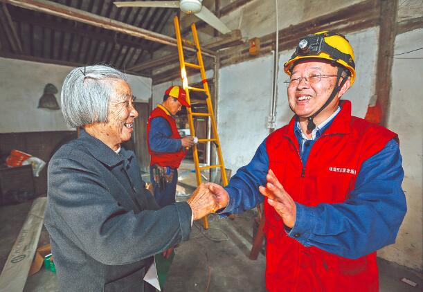 時代楷?！泵鎸γ?錢海軍：黎明同志步履不停 點(diǎn)亮萬家燈火